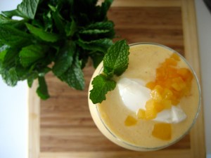 Normally I just slurp the smoothie out of a plastic quart container, but I decided to "dress up" for company with a dollup of greek yogurt mixed with honey, diced peaches, and a sprig of mint.  By the way, that cutting board is basically the size of my prep space.